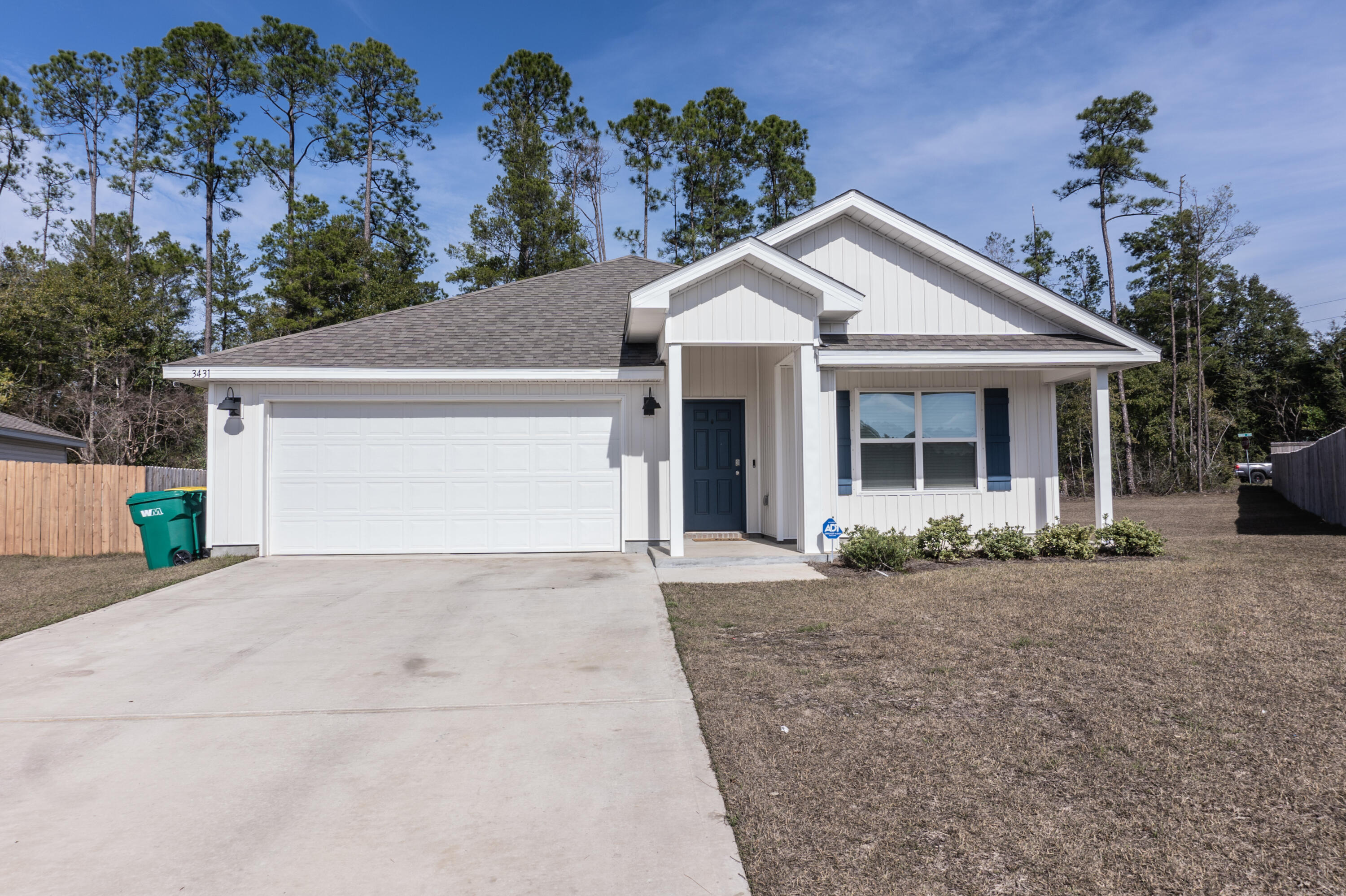 3431 Phoenix Court Crestview, FL 32539 - Photo 2 of 29 a view of a house with a yard and potted plants