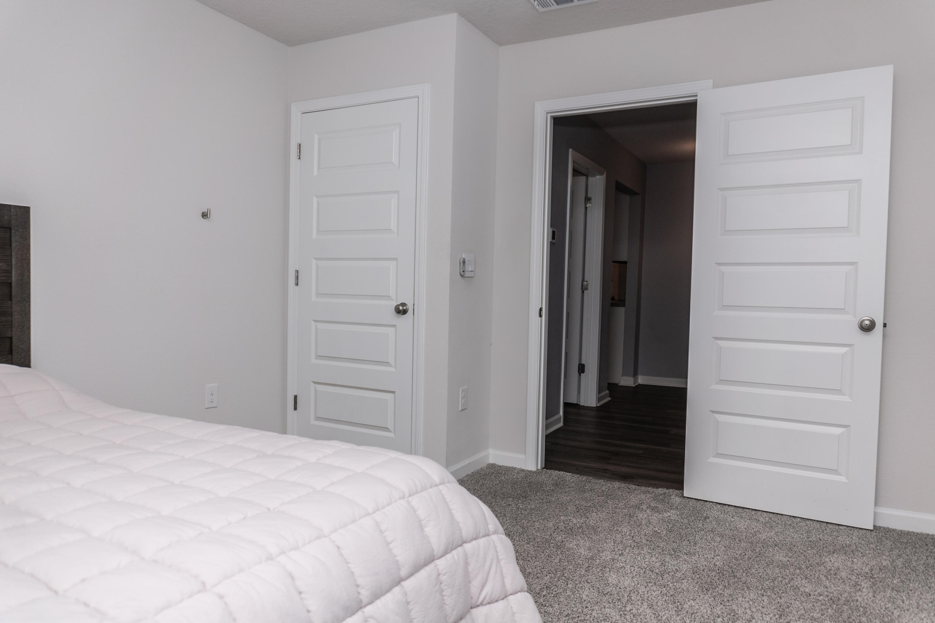 3431 Phoenix Court Crestview, FL 32539 - Photo 25 of 29 a bedroom with a bed and a bathroom