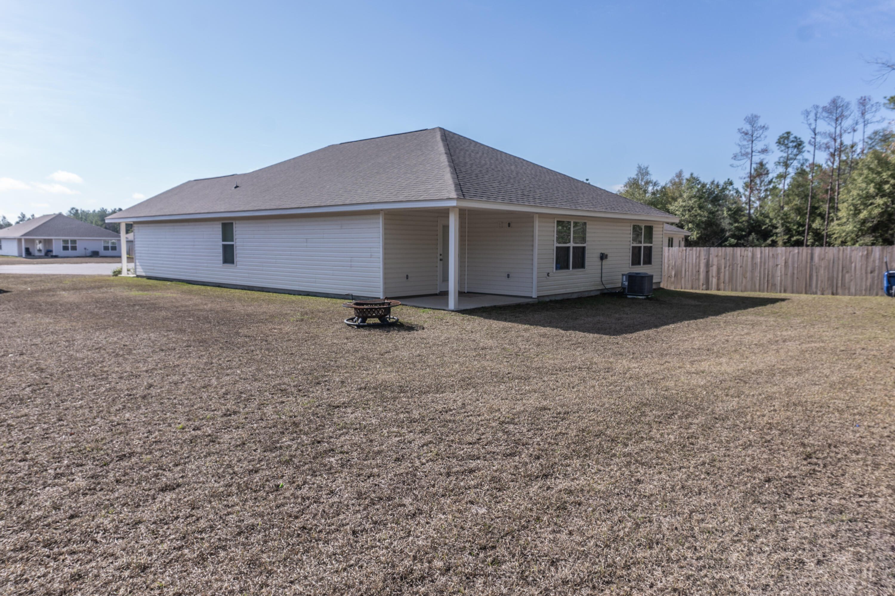 3431 Phoenix Court Crestview, FL 32539 - Photo 28 of 29 a backyard of a house