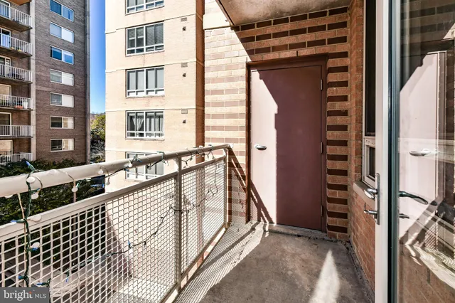 a view of balcony with a potted plant and stairs