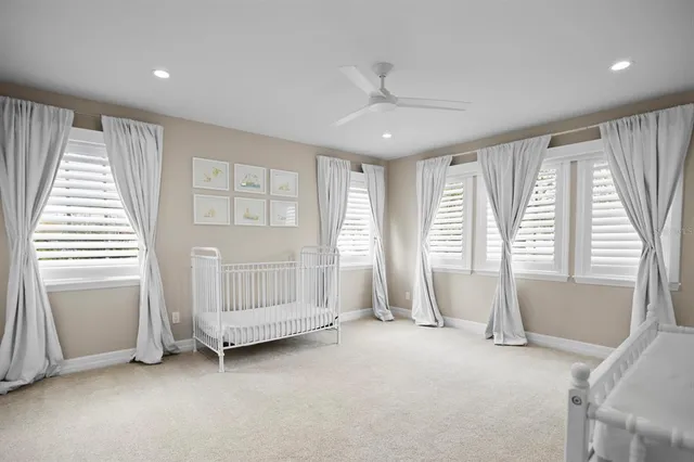 a view of room with window and balcony