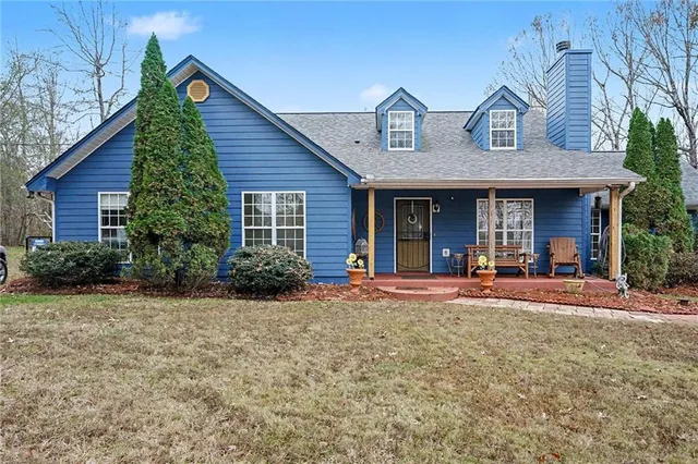 a front view of a house with porch
