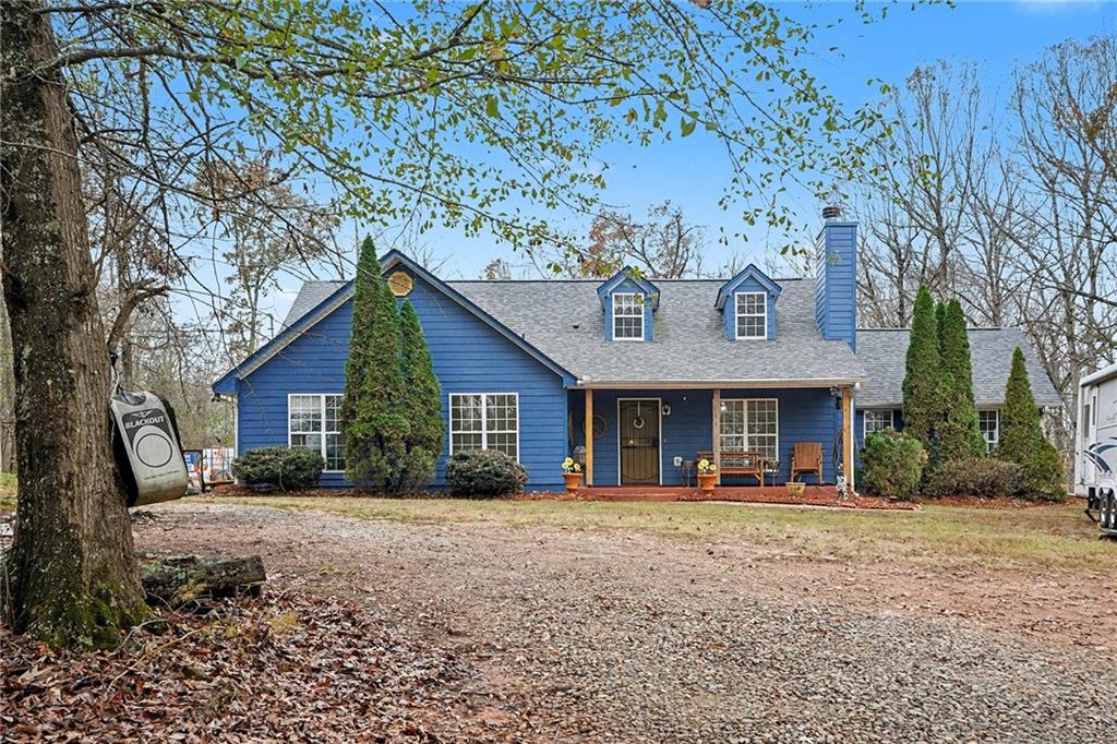 235 Cecil Jackson Road Griffin, GA 30223 - Photo 2 of 34 a front view of a house with a yard