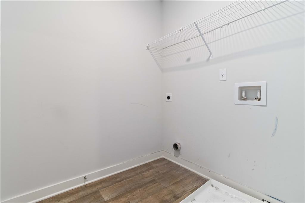 163 Kingfisher Walk Covington, GA 30014 - Photo 25 of 41 a view of a room with wooden floor