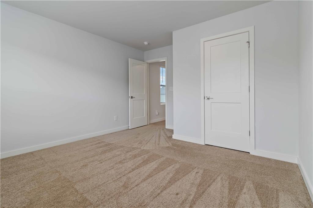 163 Kingfisher Walk Covington, GA 30014 - Photo 34 of 41 a view of an empty room