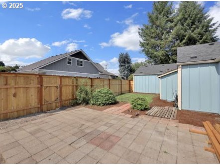 3090 Willakenzie Road Eugene, OR 97401 - Photo 21 of 22 a front view of a house with a yard and garage
