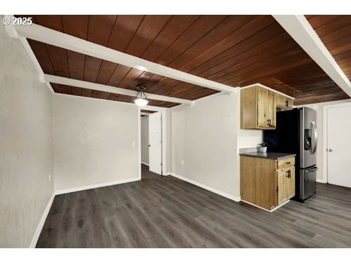 3090 Willakenzie Road Eugene, OR 97401 - Photo 9 of 22 a view of an empty room with wooden floor