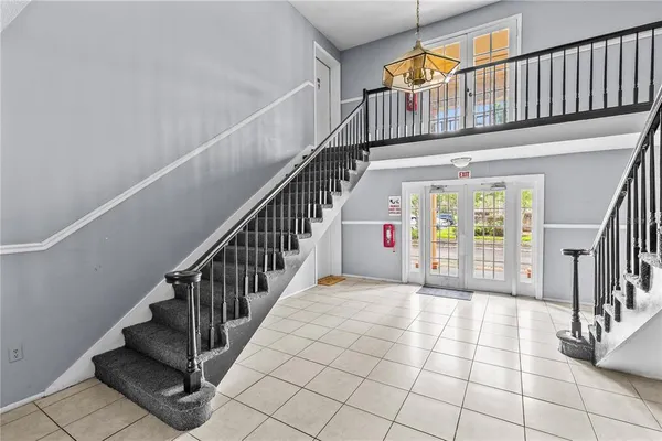a view of entryway with wooden floor