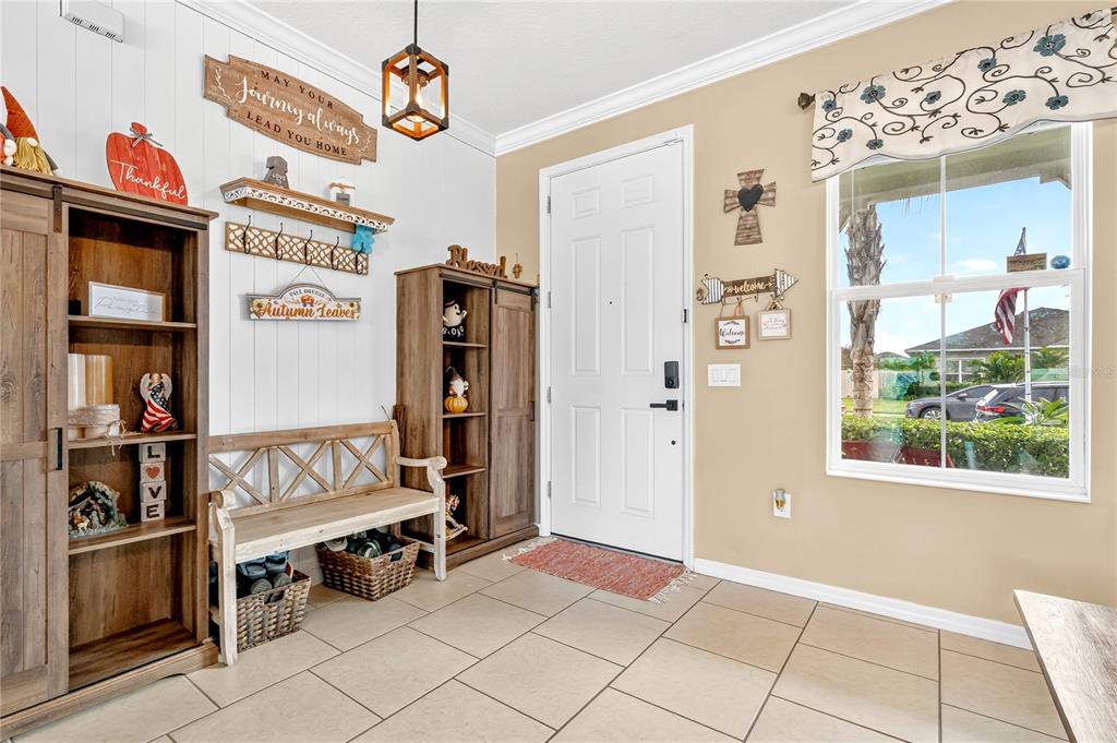 2899 Parkfield Road St. Cloud, FL 34772 - Photo 4 of 52 a view of an entryway with a livingroom
