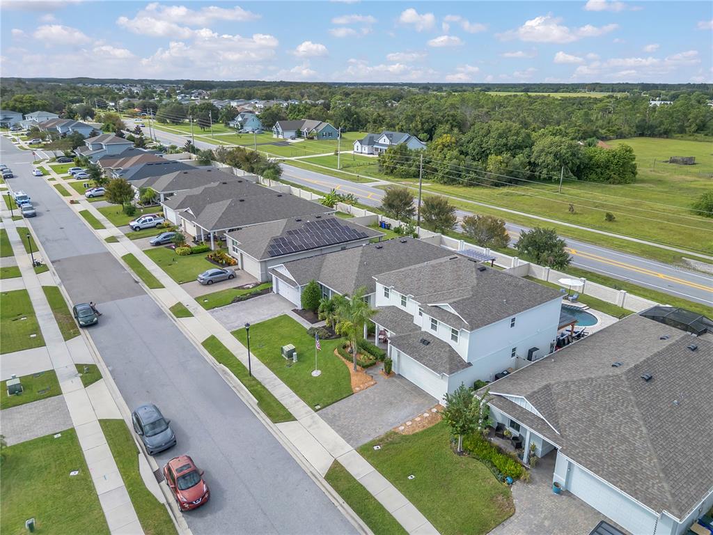 2899 Parkfield Road St. Cloud, FL 34772 - Photo 41 of 52 an aerial view of a house with a garden