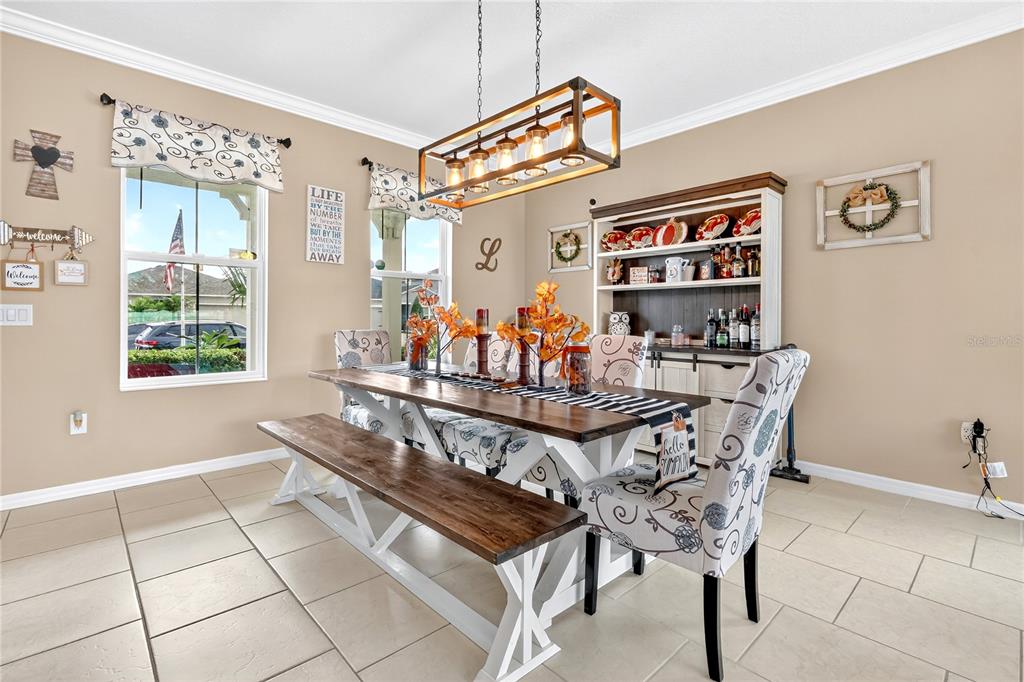 2899 Parkfield Road St. Cloud, FL 34772 - Photo 5 of 52 a dining room with furniture and window