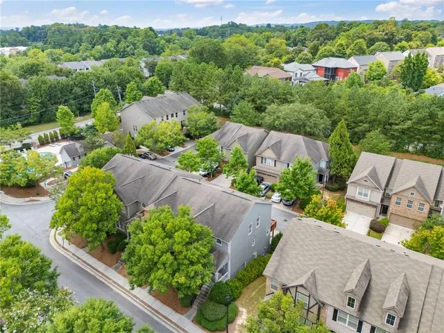 an aerial view of a house with a garden