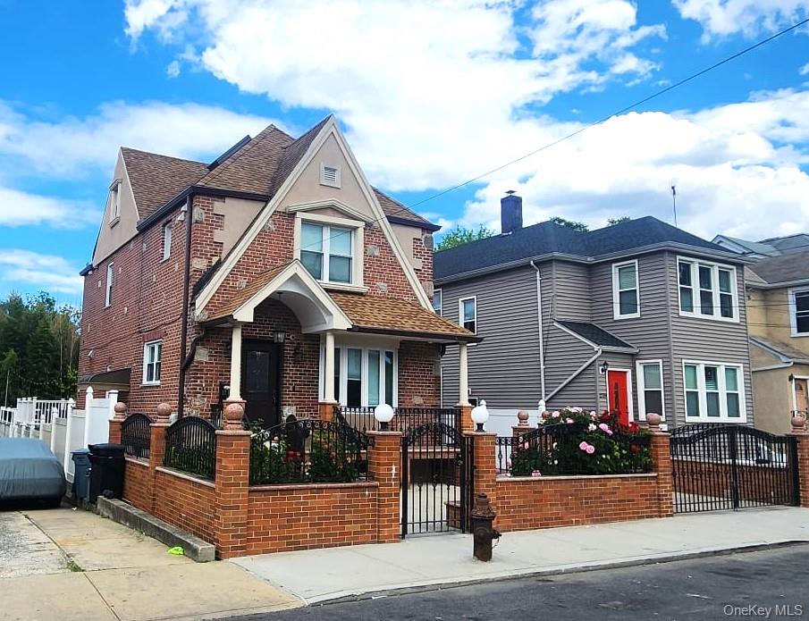 27-15 Butler Street Queens, NY 11369 - Photo 1 of 18 a front view of a house
