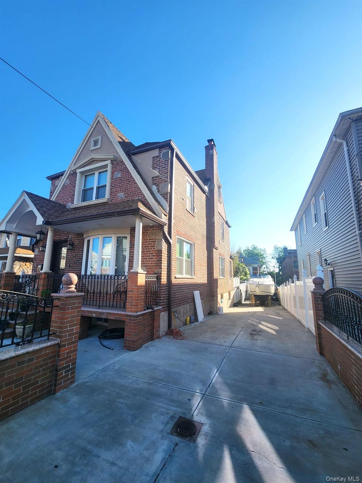 27-15 Butler Street Queens, NY 11369 - Photo 17 of 18 a view of a house with a outdoor space