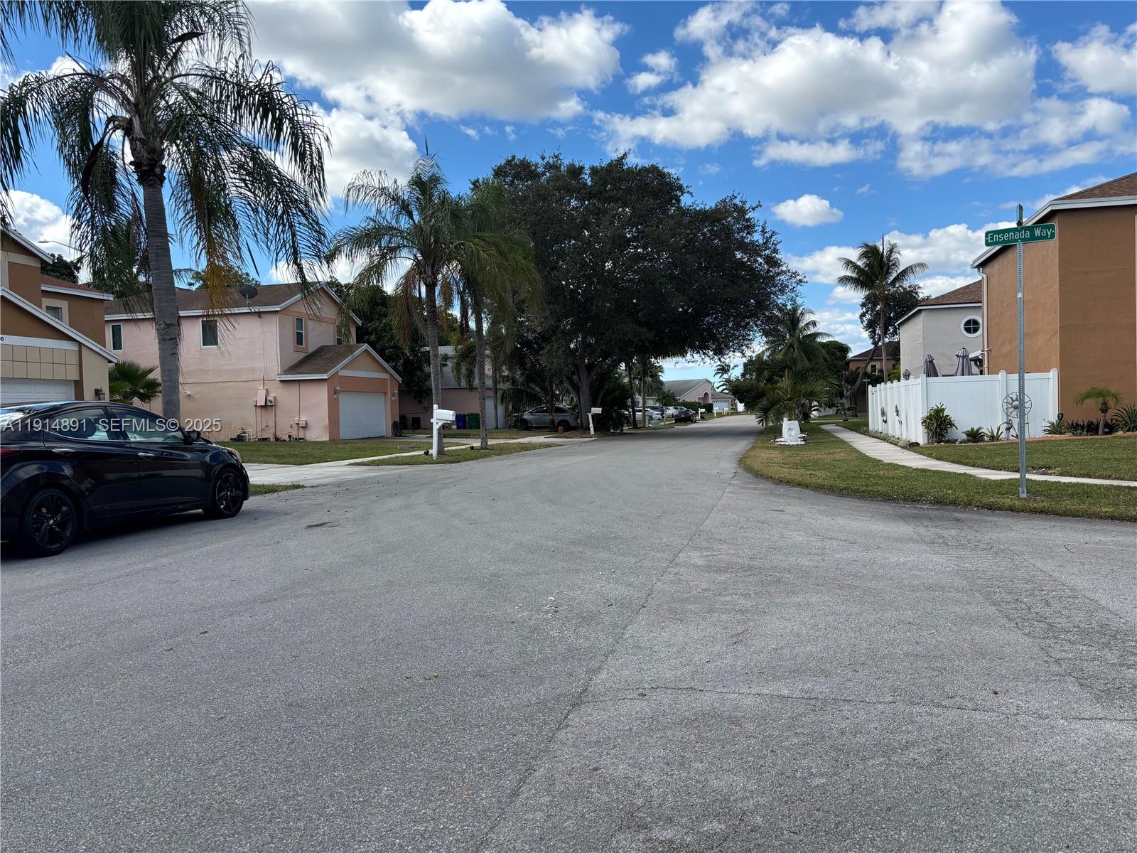 9470 Atlantic Street Miramar, FL 33025 - Photo 5 of 7 a car parked on the side of the road
