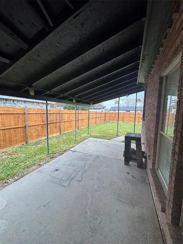 a view of an empty room with a balcony