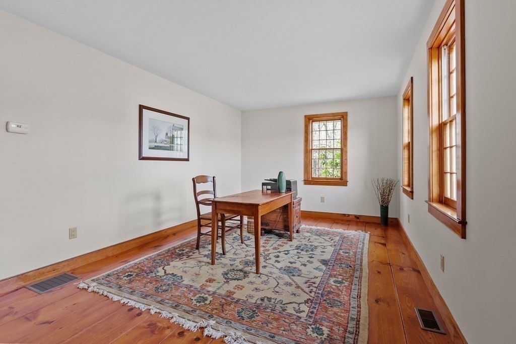 24 Rocky Dundee Road Bolton, MA 01740 - Photo 12 of 35 a view of a workspace with furniture and a window