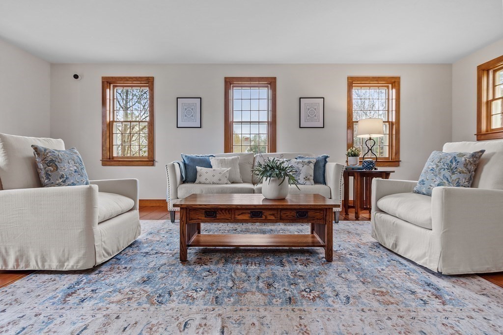 24 Rocky Dundee Road Bolton, MA 01740 - Photo 3 of 35 a living room with furniture and a couch