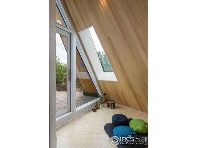 a picture of a room with a floor to ceiling window