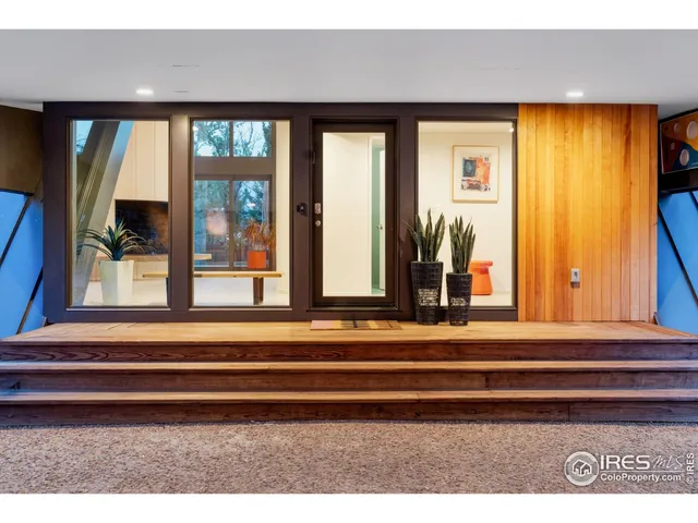 a view of a entryway door front of a house