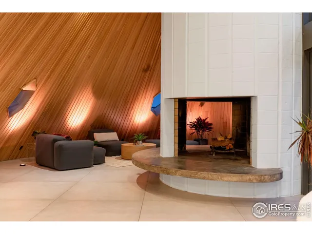 a lobby with furniture and window