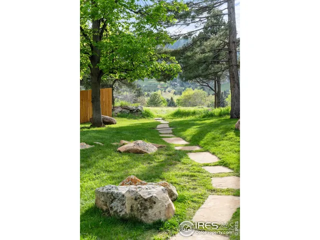 a view of a backyard with garden