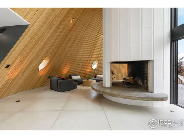 a view of a patio with table and chairs