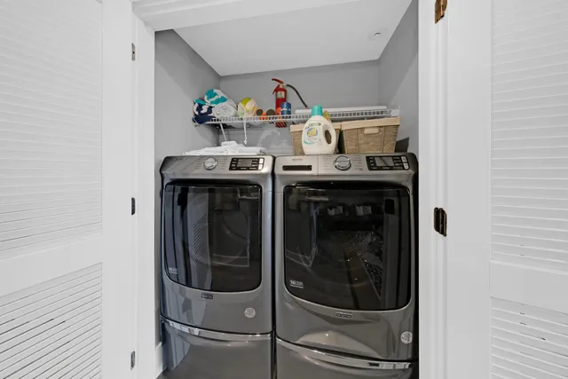a utility room with dryer and washer