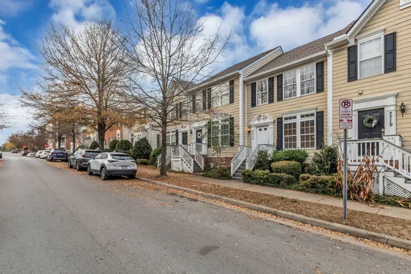 a view of street with parked cars