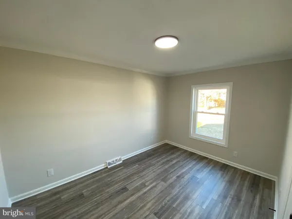 a bathroom with a sink toilet and vanity