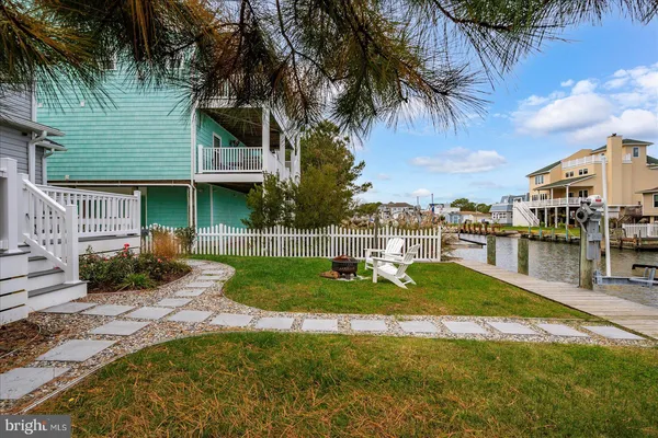 a view of a balcony with wooden floor
