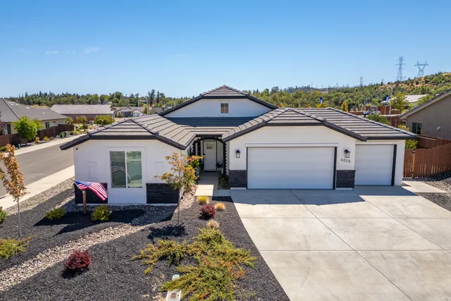 a view of a house with a patio
