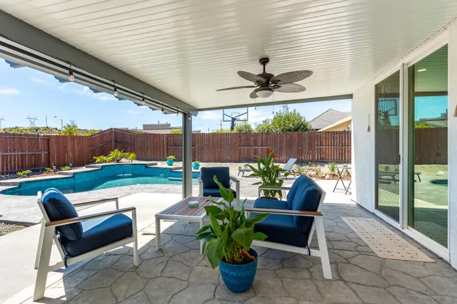 a outdoor living space with furniture and garden view