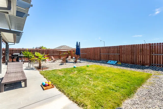 a view of a swimming pool with a lounge chairs