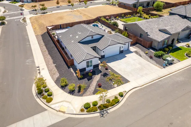 a view of a swimming pool with chairs