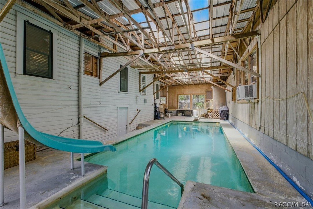 6 62nd Street Yankeetown, FL 34498 - Photo 17 of 55 a view of a swimming pool with a patio
