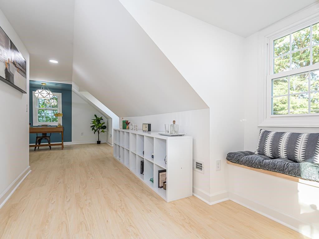 1703 Patton Road Raleigh, NC 27608 - Photo 23 of 30 a view of entryway and hall with wooden floor