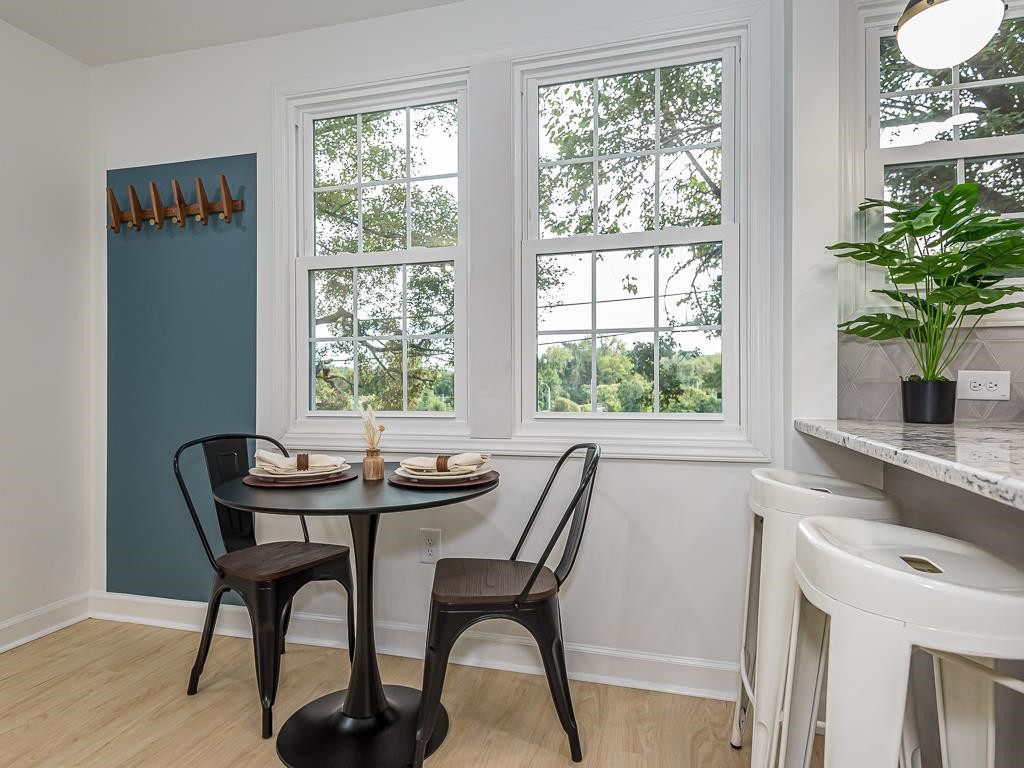 1703 Patton Road Raleigh, NC 27608 - Photo 9 of 30 a dining room with furniture and window
