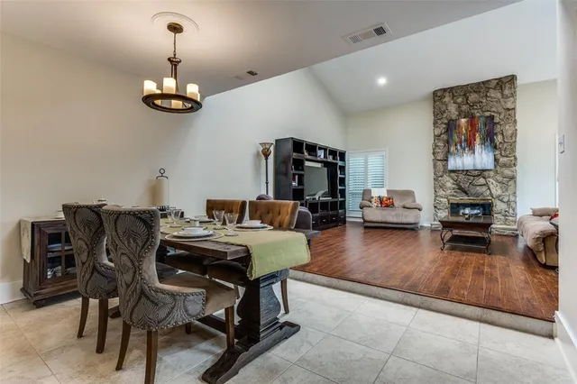 a view of a livingroom with furniture and a flat screen tv