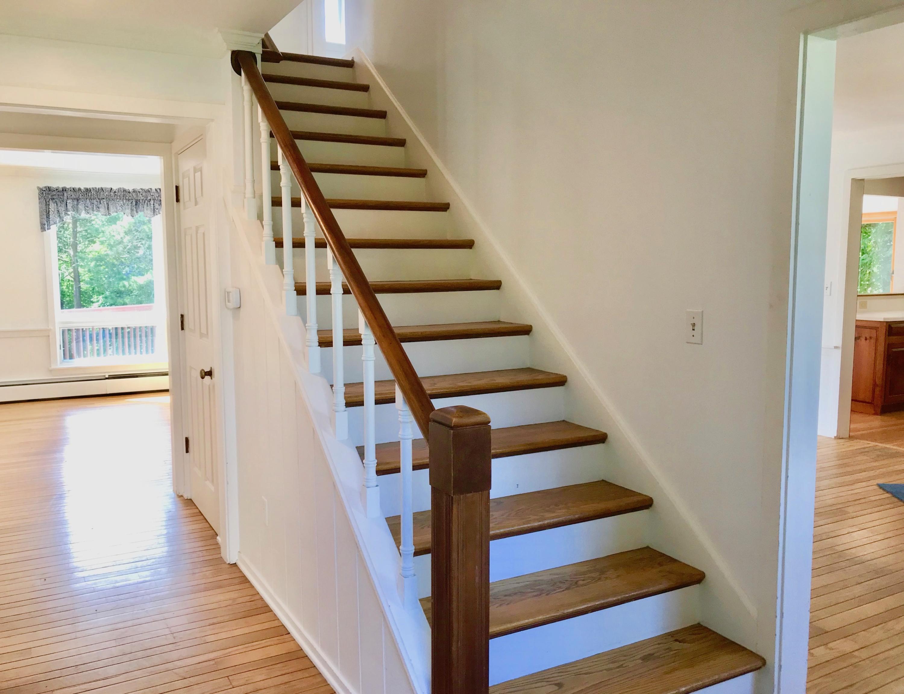 26 Champlain Road Orleans, MA 02653 - Photo 17 of 32 a view of entryway and hall with wooden floor
