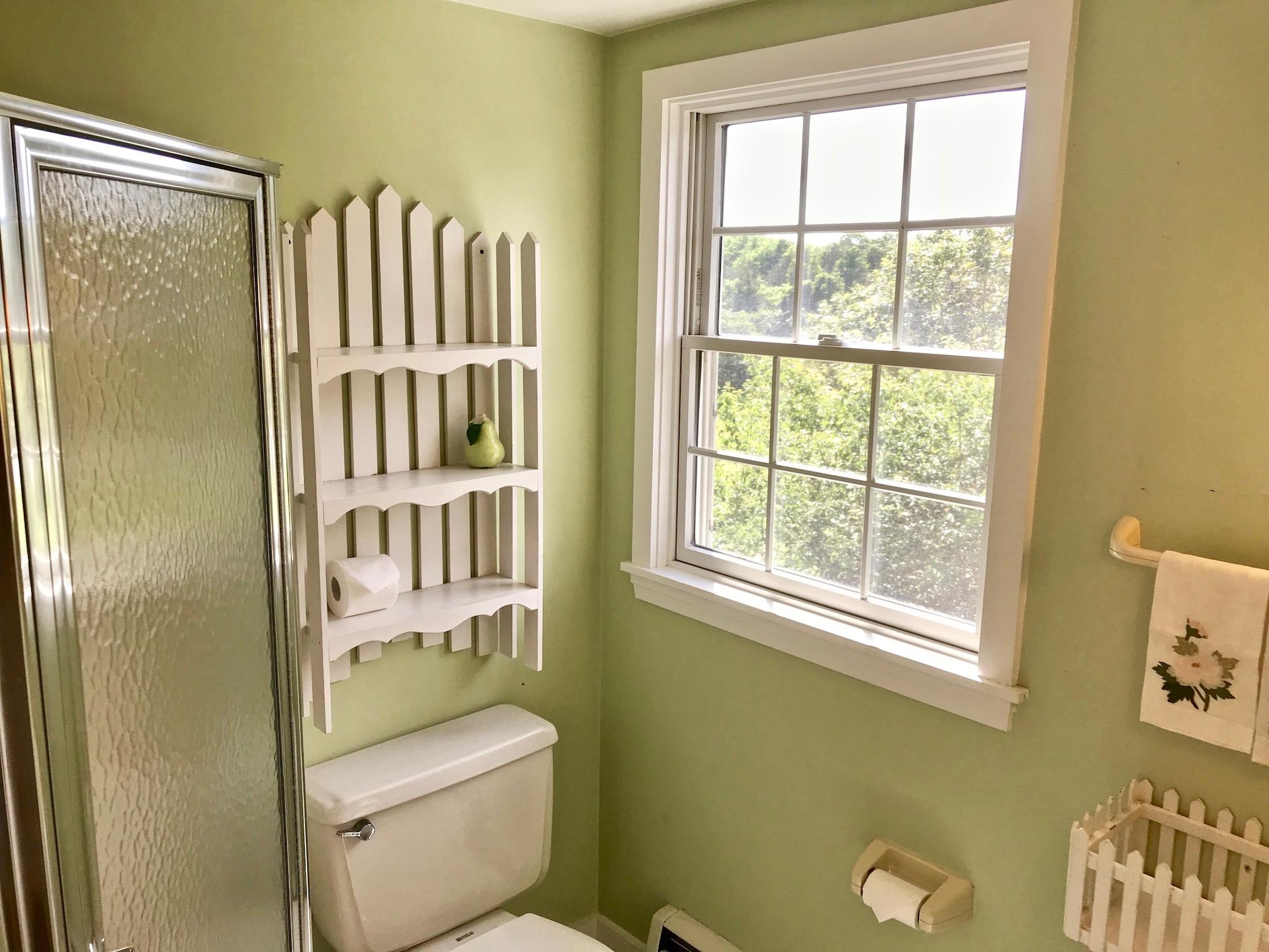 26 Champlain Road Orleans, MA 02653 - Photo 21 of 32 a bathroom with a toilet and a shower