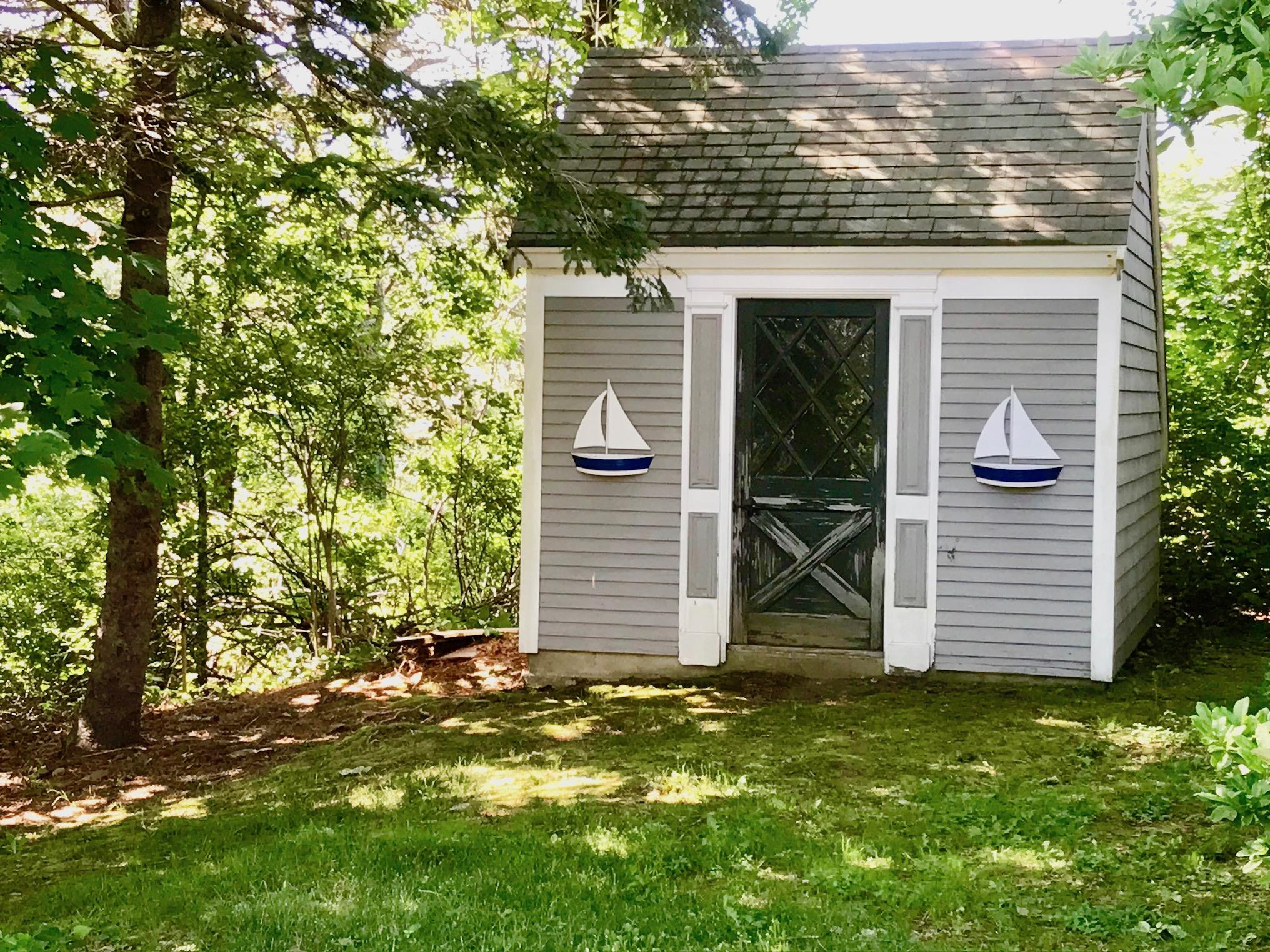 26 Champlain Road Orleans, MA 02653 - Photo 27 of 32 a view of a house with a door