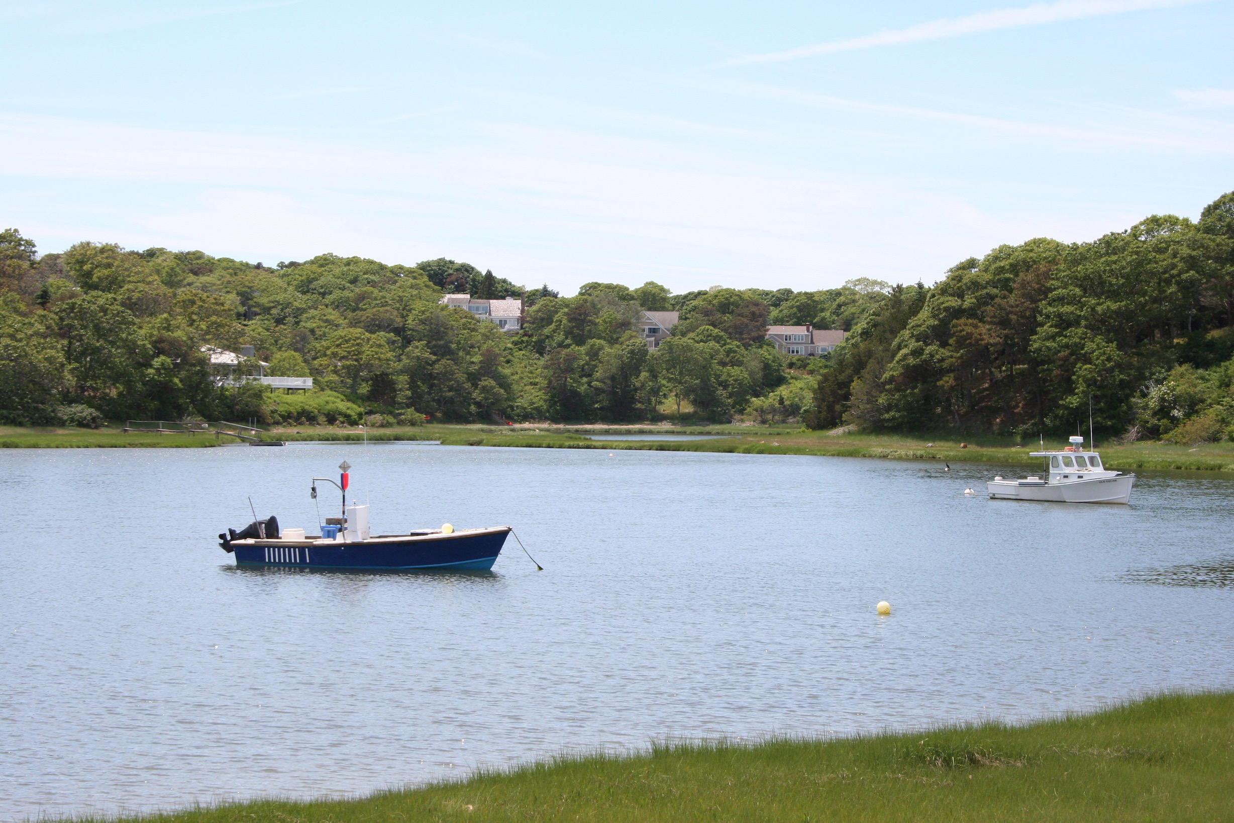 26 Champlain Road Orleans, MA 02653 - Photo 32 of 32 a view of a lake with houses in the back