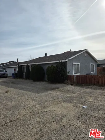 a view of house with outdoor space