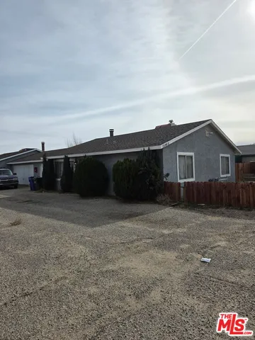 a view of house with outdoor space