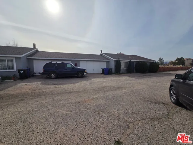 a car parked in front of a house