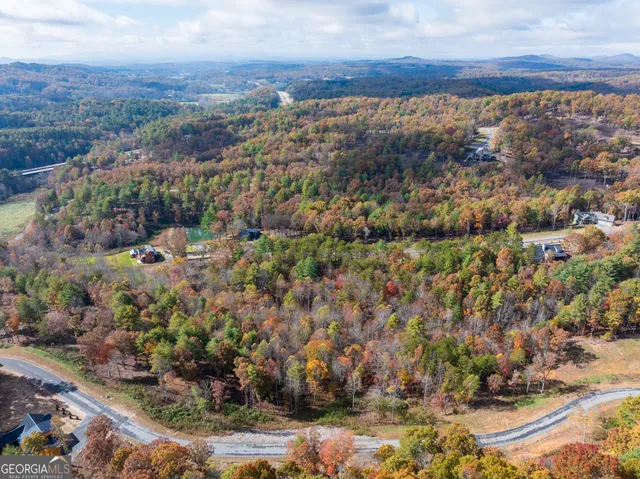 a view of road with trees