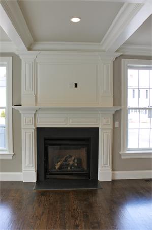 4 Claflin Road Wellesley, MA 02482 - Photo 14 of 20 a living room with a fireplace