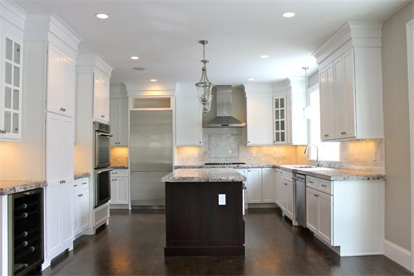 4 Claflin Road Wellesley, MA 02482 - Photo 6 of 20 a kitchen with stainless steel appliances granite countertop a sink a stove and a refrigerator
