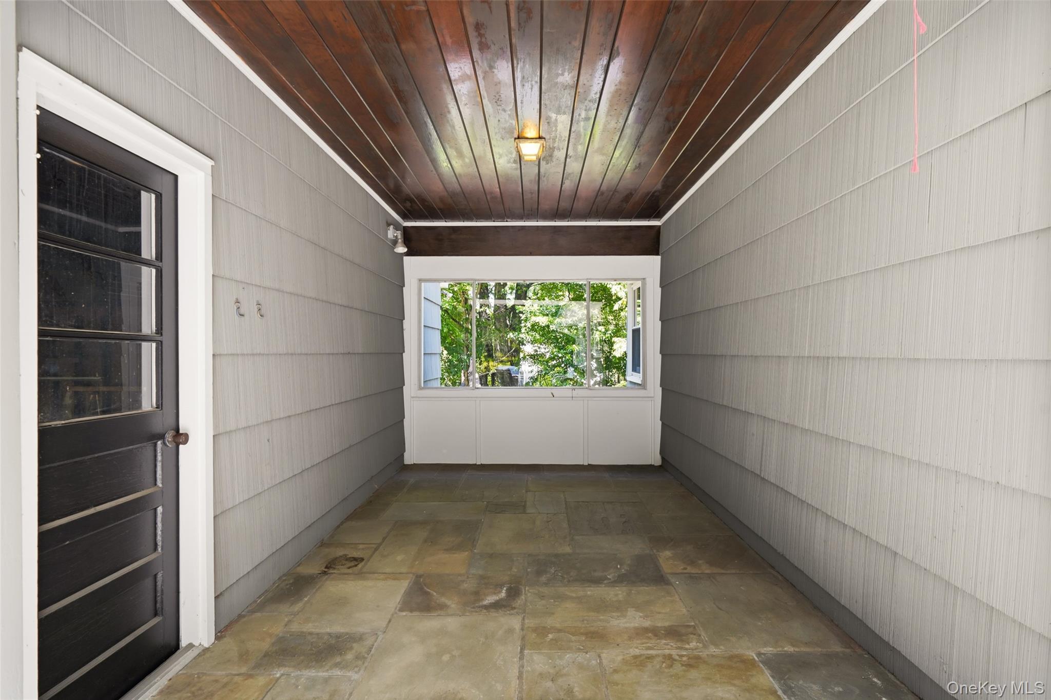 41 Cherry Ridge Road Katonah, NY 10536 - Photo 17 of 20 Terrace/Breezeway w/ entrance to Garage.